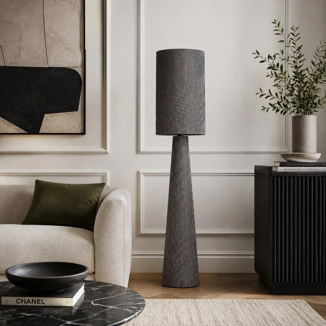 Gray striped floor lamp styled in a sofa corner