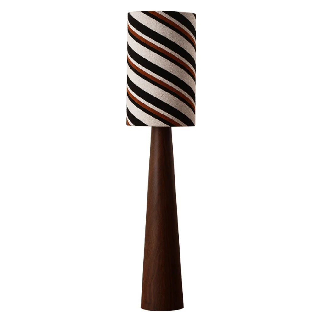 Striped fabric floor lamp with tapered wood grain base on white background