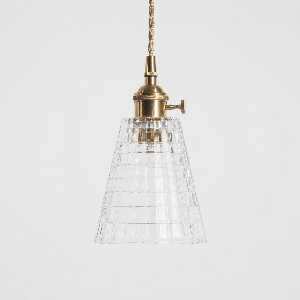 Style E textured glass shade with antique brass E27 socket, front view