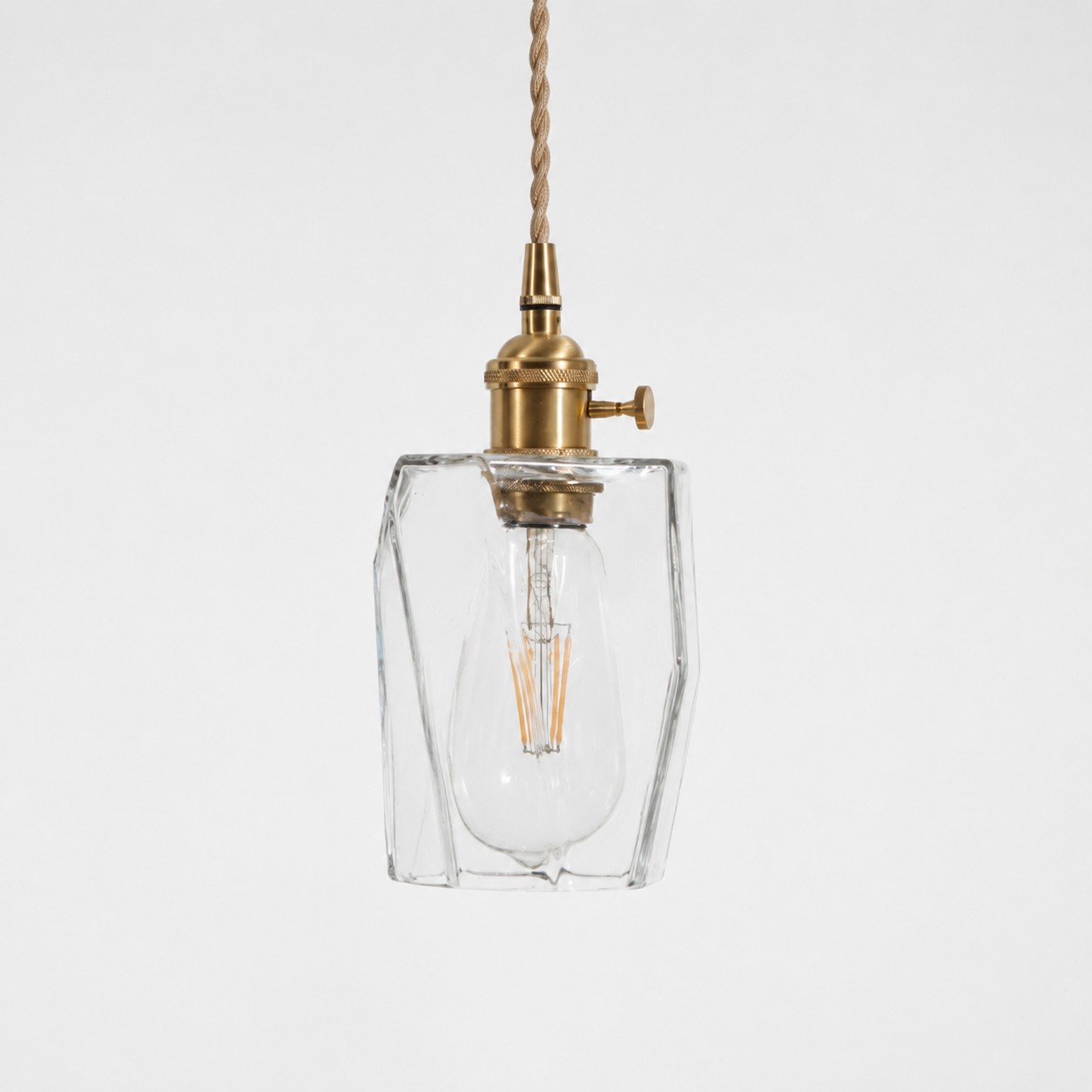 Style X textured glass shade with antique brass E27 socket, front view