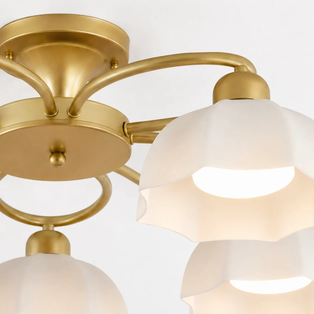 Brass frame and white glass shade detail